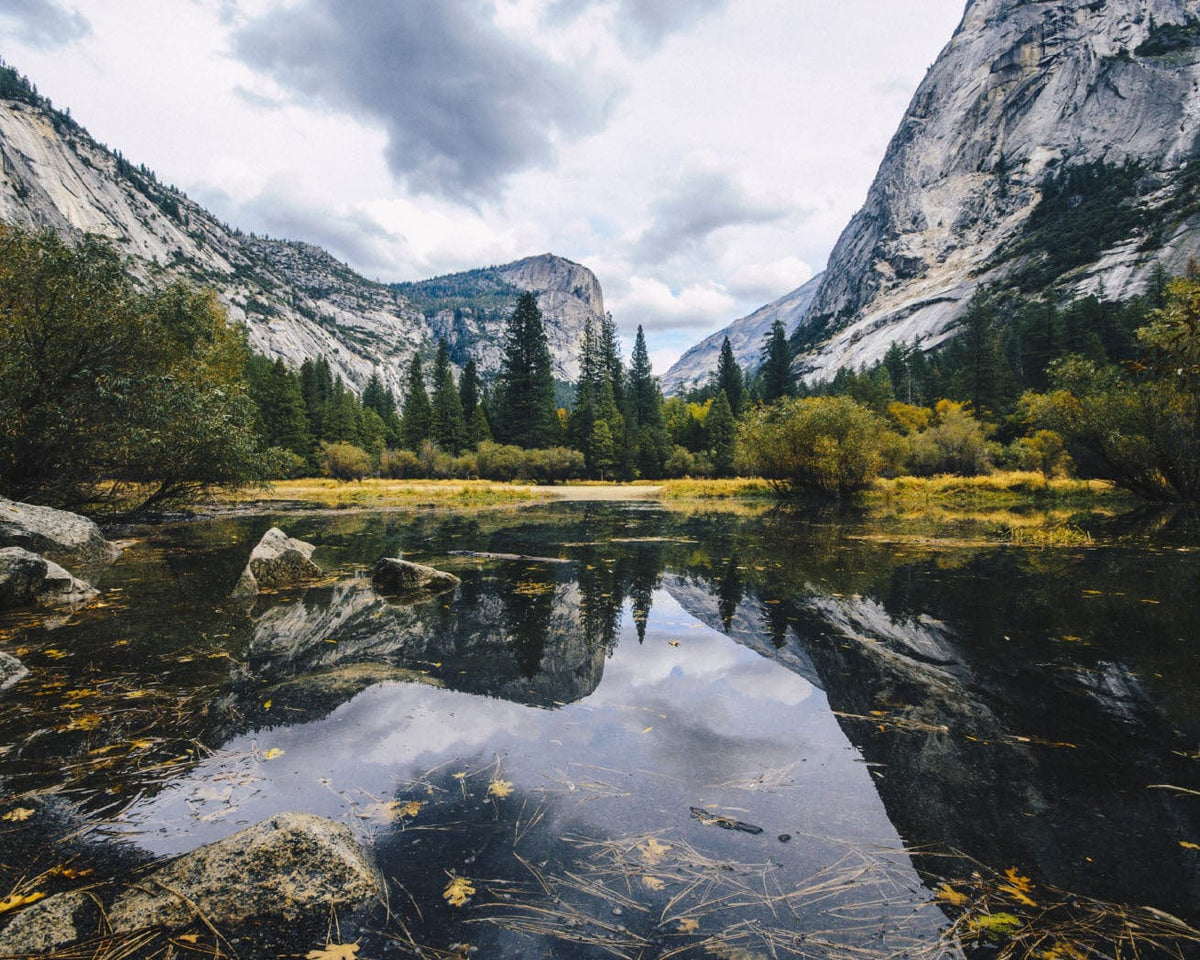 National forest lake with mountains and trees