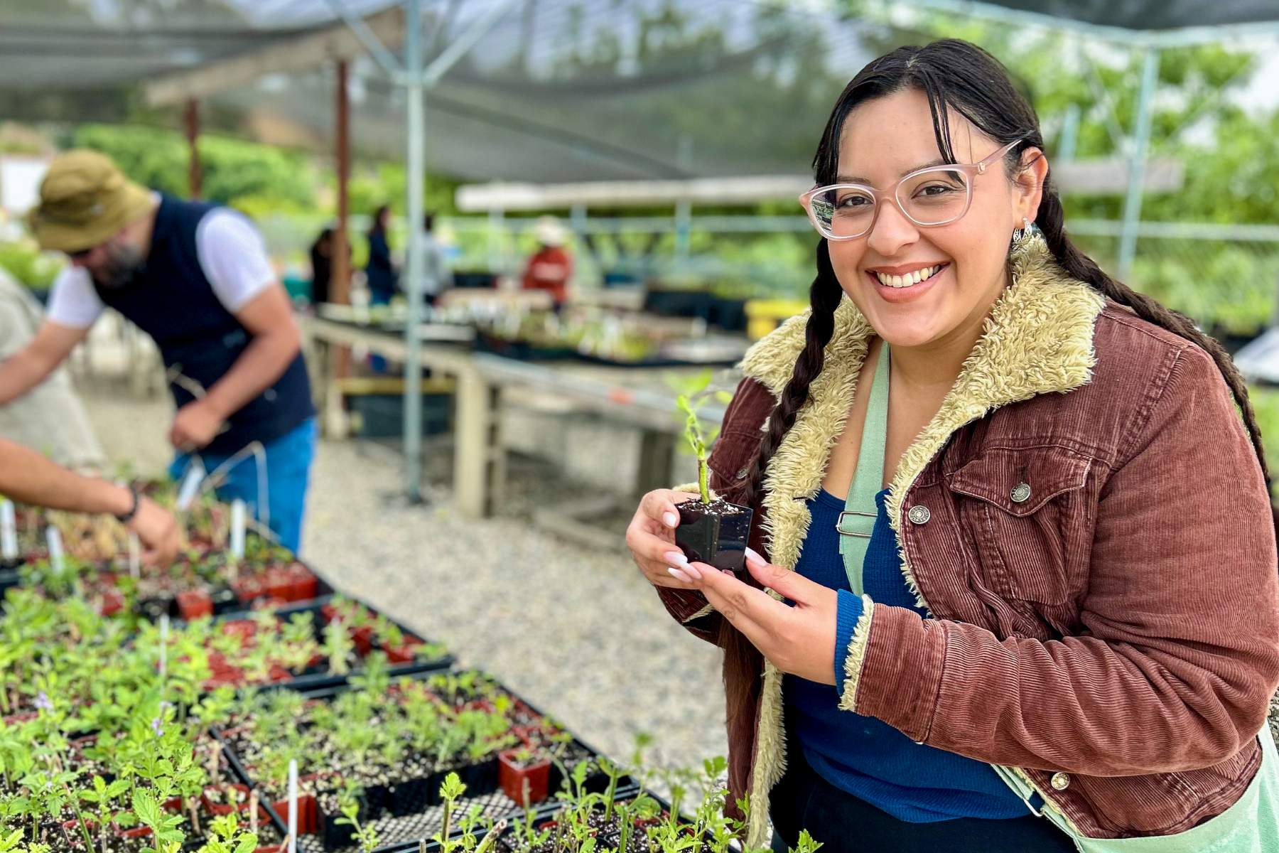 smiling volunteer at LA Ascot Hills Park Nursery