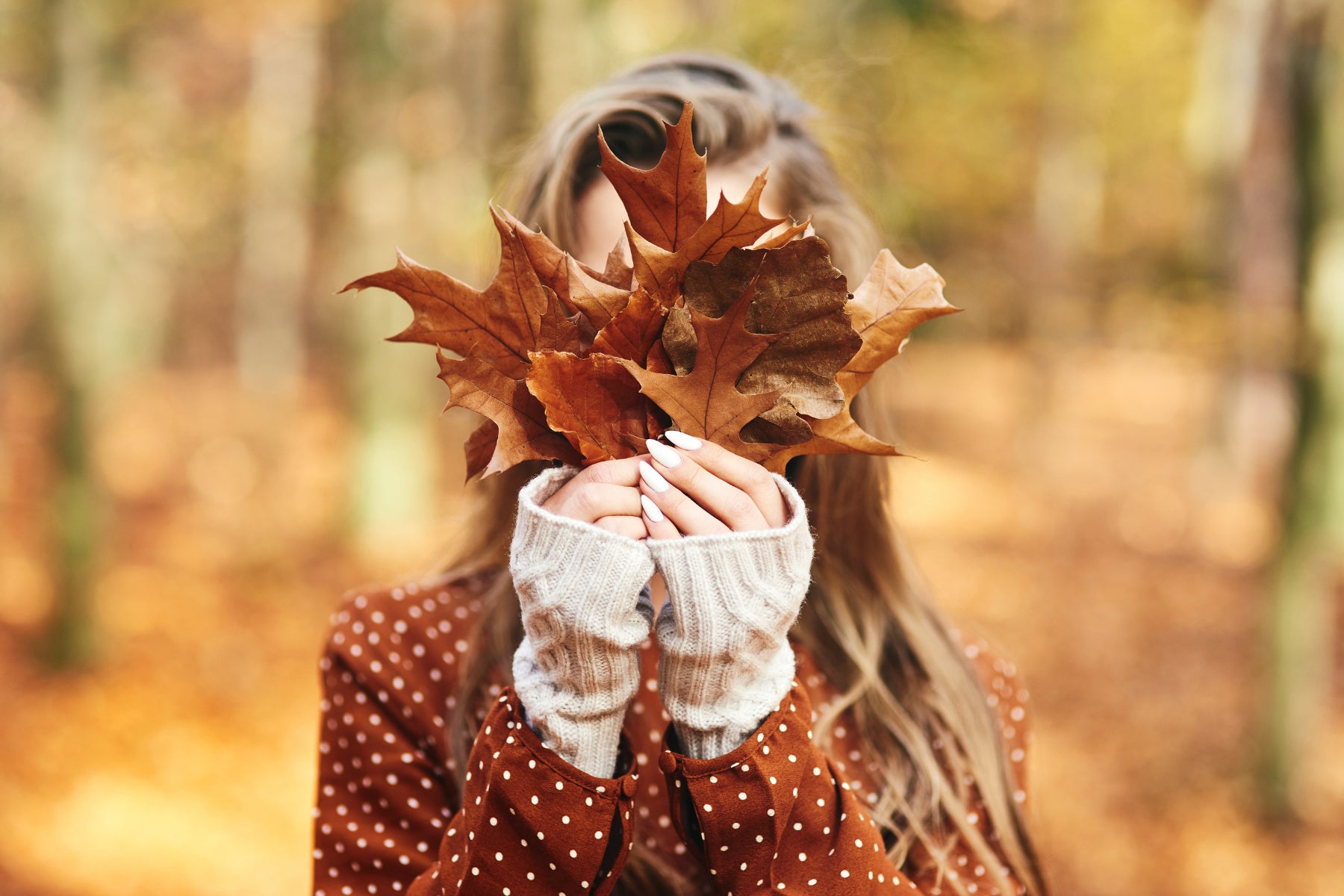 happy woman fall leaves