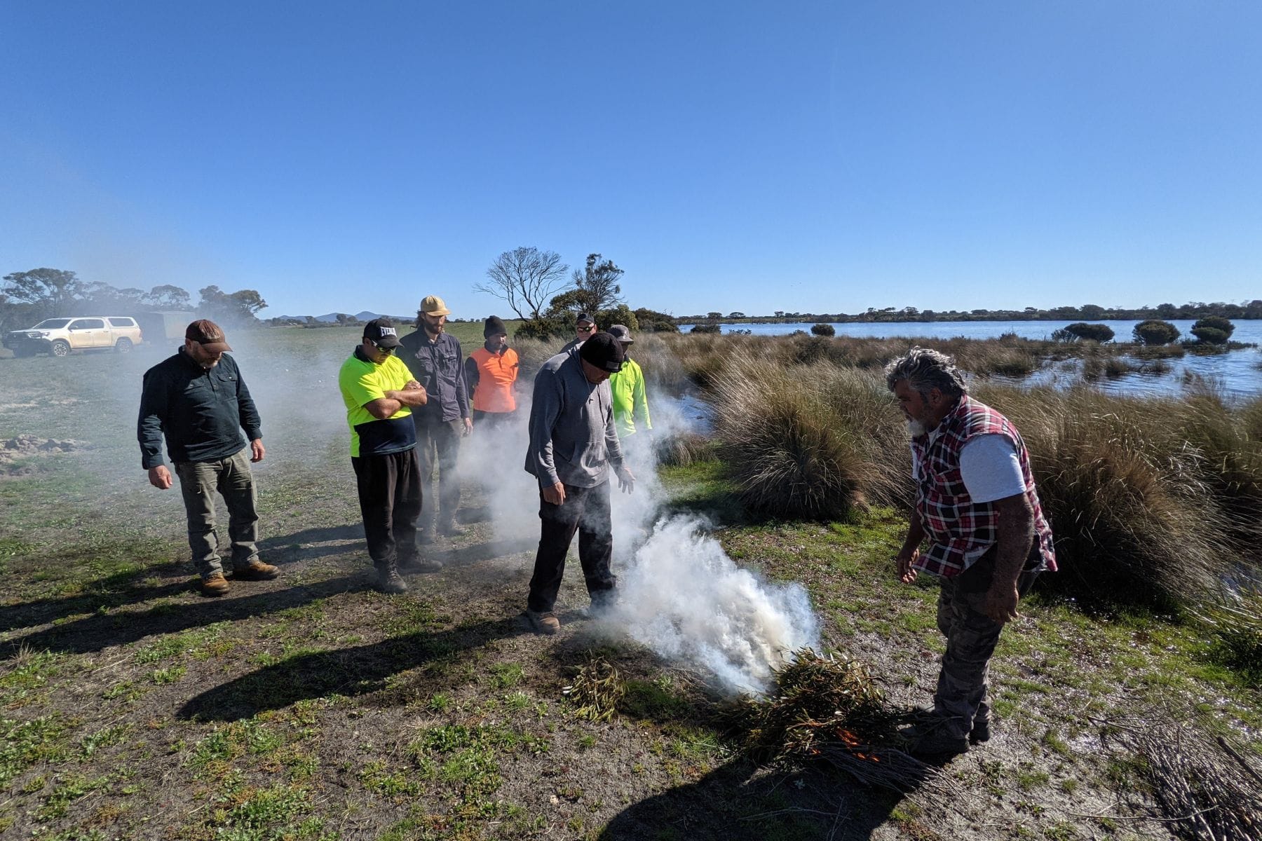 Noongar Indigenous smoking ceremony blessing reforestation tree planting site in Australia