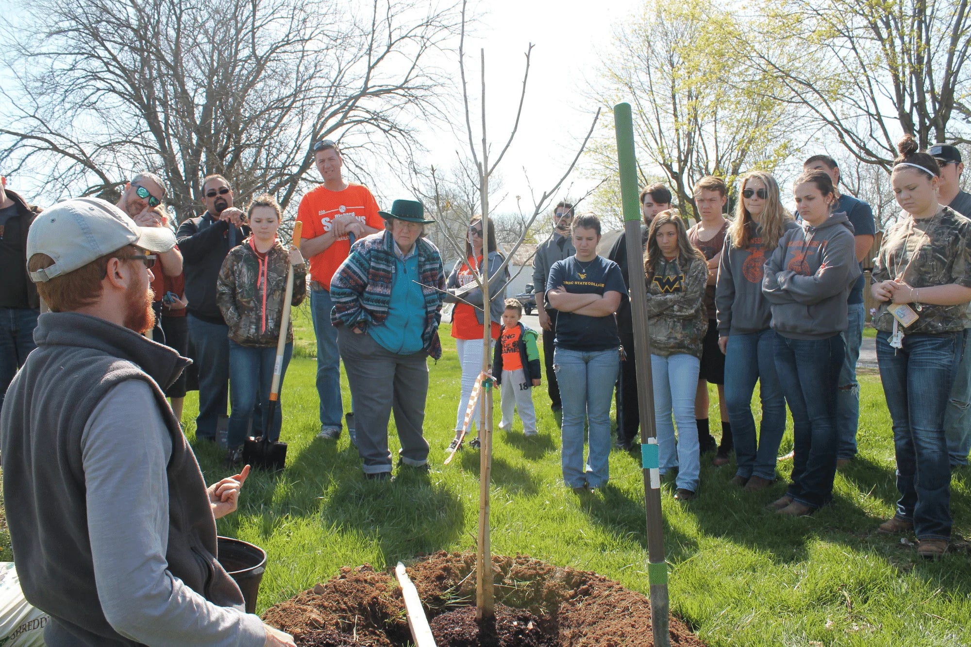 tanner haid in front of trees teaching urban forestry 